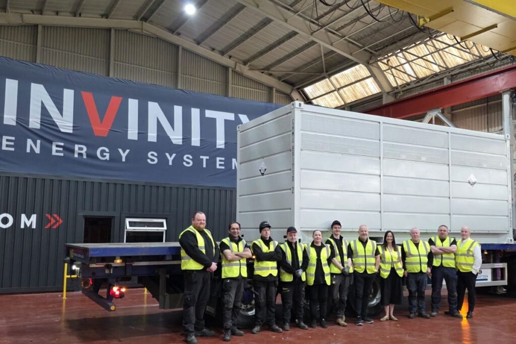 Members of the Invinity team charge the last battery at the company's Motherwell factory.